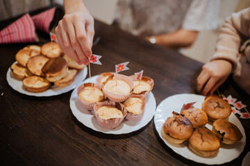 Siblings enjoy homemade treats during a family gathering in a cozy kitchen