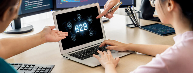 Business person navigates B2B landscape, harness technology to enhance business-to-business...