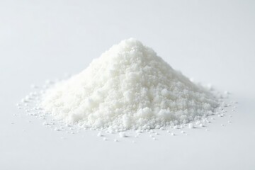 Pile of white granulated sugar on white background, recipe, reflecting