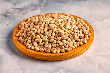 Dry Chickpeas on Wooden Plate
