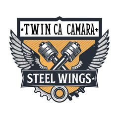 Design a vintage-style twin camshaft badge featuring steel wings flanking a stylized 'F', evoking speed and power.  High-resolution, detailed rendering.