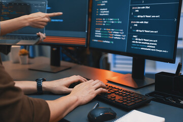 Serious of IT developers discussing intelligent website development coder system running data...