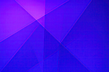  Abstract geometric background with overlapping triangles in purple and blue hues, creating depth and a layered digital texture.