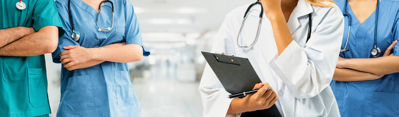 Healthcare people group. Professional doctor working in hospital office or clinic with other...