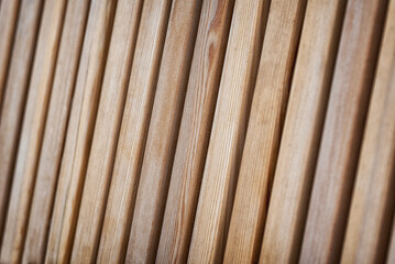 Inclined wooden slats, shallow depth of field.