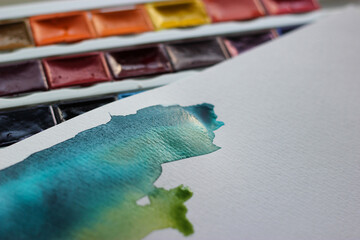 Watercolor stains and watercolor paints. Watercolor texture. Watercolor paints in cuvettes....