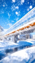 Snowy cityscape with modern glass pedestrian bridge spanning a tranquil, snow-covered waterway under a bright, blue sky with falling snow