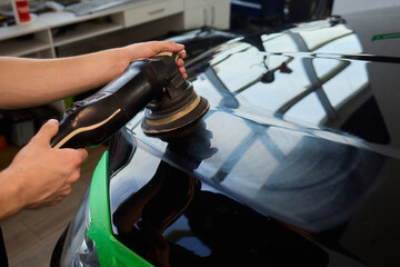 A Detailed Close Up of the Car Polishing Process in the Field of Automotive Detailing