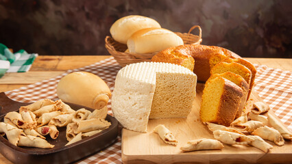 Breakfast table, beautiful breakfast table in Brazil with cake, cheese breads and more, on table with tablecloth, selective focus.