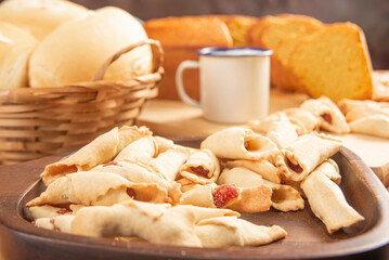 Breakfast table, beautiful breakfast table in Brazil with cake, cheese breads and more, on table with tablecloth, selective focus.