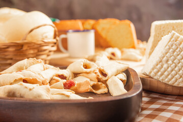 Breakfast table, beautiful breakfast table in Brazil with cake, cheese breads and more, on table with tablecloth, selective focus.