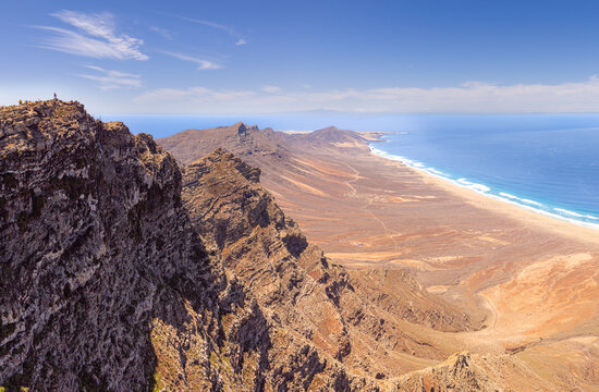 Beautiful high aspect aerial panoramic view of Cofete Beach from Pico de la Zarza the majestic volcanic mountain backdrop in Fuerteventura Canary Islands Spain