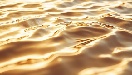 Glistening gold water with gentle waves, a smooth, reflective surface