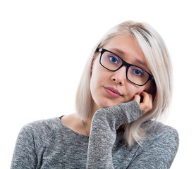 Sad pleading young woman wears eyeglasses looks bored of waiting for a new idea to come. Tired girl...