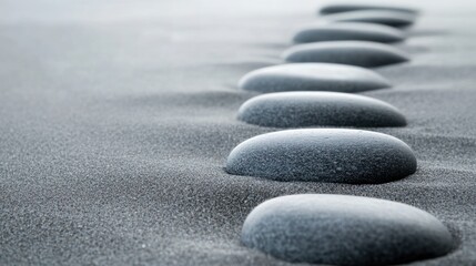 Smooth stones on sandy path