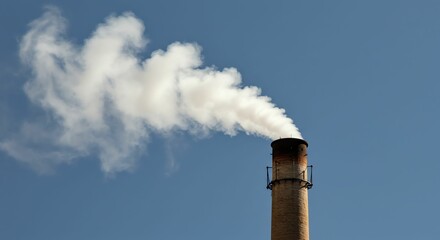 Smokestack with White Smoke in Clear Blue Sky