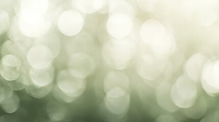 Obraz premium an out of focus background of blurred green hues with bokeh effects, creating a sense of depth, while the foreground appears in crisp detail with soft blurs and bokeh highlights on the bottom right