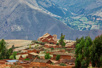 The Church of San Francisco de Maras, with its adobe walls and serene setting, reflects the deep...