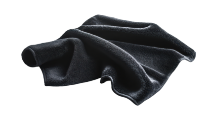 A dark gray, plush towel casually draped, showcasing its soft texture and absorbent nature