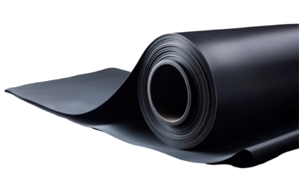 A rolled dark-grey, matte-finish sheet material, possibly synthetic, rests on a dark surface, partially unfurled, showcasing its texture and thickness
