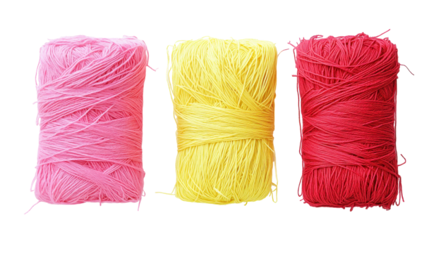 Three tightly wound yarn skeins in pink, yellow, and red, displayed against a black background