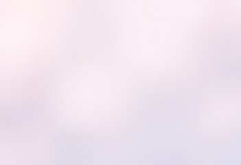 Soft, pastel-toned blurred background.