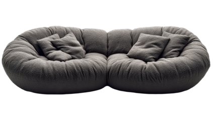 Plush, gray, double-seated sofa with rounded, overstuffed cushions and relaxed, inviting form
