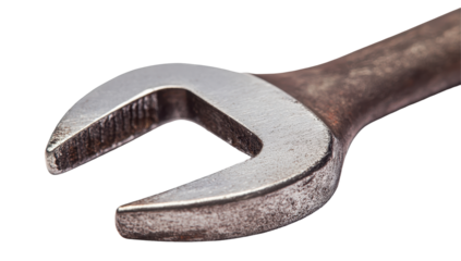 Close-up of a well-worn, metallic open-end wrench showing signs of use and age, with a dark background