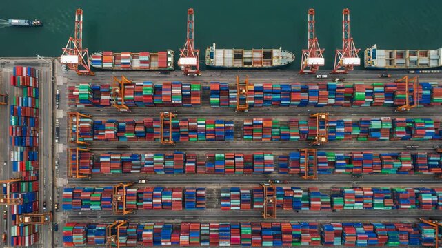 Time Lapse, Container ship loading and unloading in deep sea port, 4k video, aerial view, Low angle View of business logistic import and export freight transportation by container ship, 