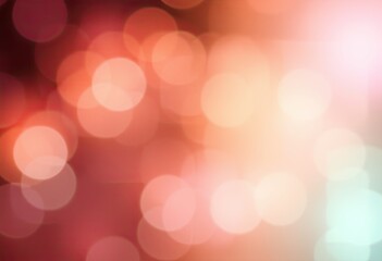 Soft, out-of-focus lights create a warm, colorful background.