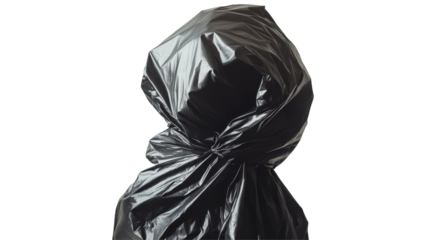 A figure is completely shrouded in a dark, crinkled plastic bag, obscuring their identity and features, creating a mysterious and unsettling image