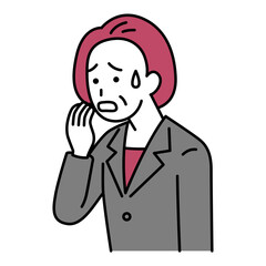 動揺している中年のスーツの女性