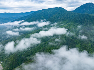 Obraz premium mountain landscape with clouds，mountains in the mountains