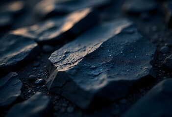 Macro shot of rugged black basalt surface, weathered texture with fine white dust accents, uneven and tactile grunge look, realistic depth and lighting, isolated with negative space on one side