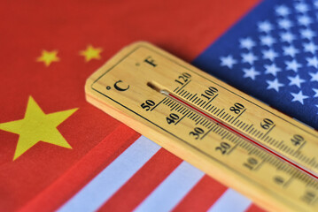 Wooden thermometor on China flag and US flag for  superpower completition concept such as the...