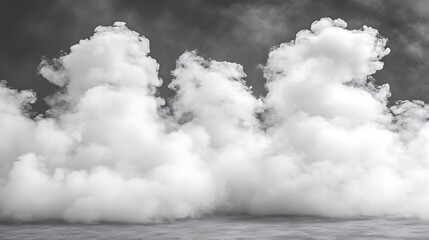 Massive white clouds against a dark sky