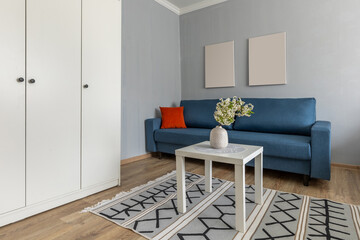 Cozy Living Room with Blue Sofa