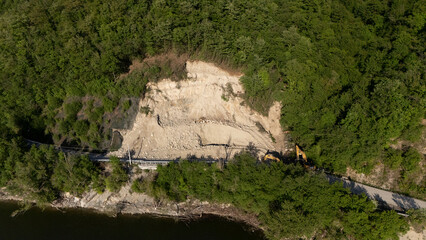 Drone captures excavators and rocks on the SP21 near Vernasca after an early morning landslide in...