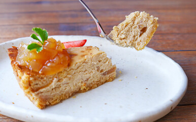Closeup of Fork Scooping Delectable Toddy Palm Cheesecake