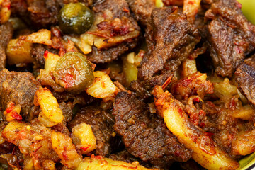 Meat stew made from beef with potatoes and pickles.
