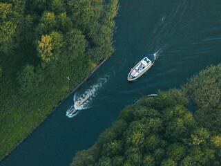 Aerial View of Two Boats Navigating River