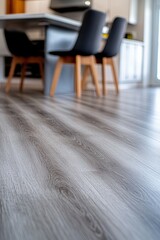 Time-lapse style sequence of a living room floor being transformed with modern vinyl planks. 