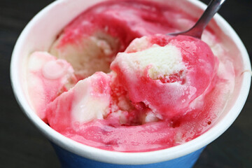Closeup of mouthwatering strawberry yogurt ice cream