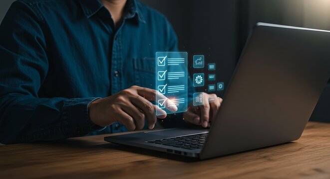 Man interacting with digital checklist and settings icons on laptop in dim lighting environment