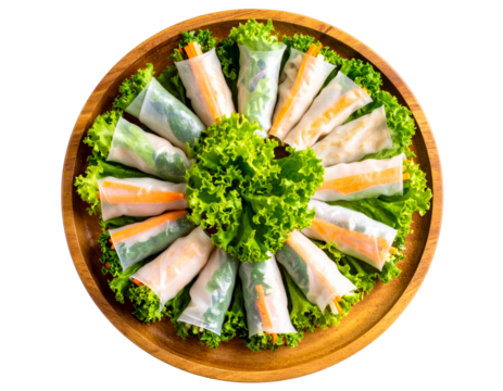 Round wooden plate with spring rolls arranged in the shape of yin-yang isolated on a transparent background - Powered by Adobe