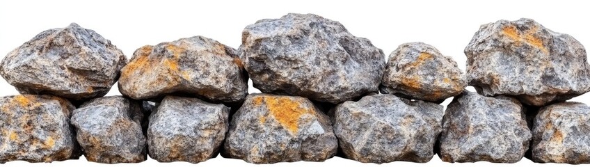 A row of grey and brown rocks with some yellow hues