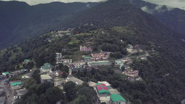 A stunning drone view of the mountain cityscape in Lohajung, Uttarakhand, India.