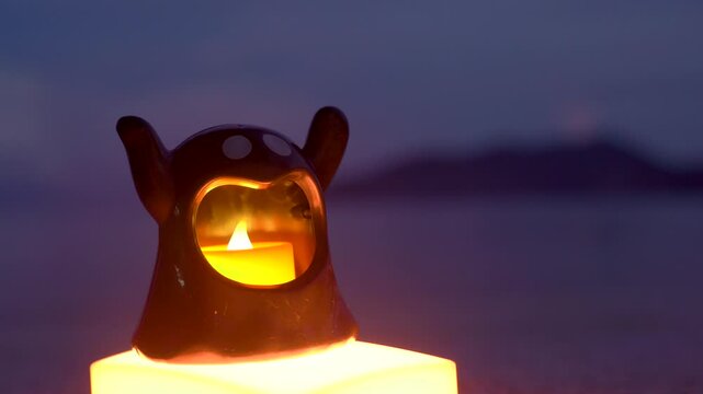 Concept: Halloween beach and ocean background with sea ghost with witch ghost fire, dark, scary tone.