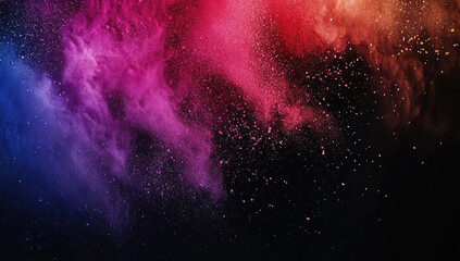Abstract explosion of vibrant colored powder on dark background