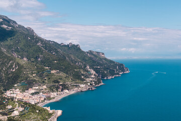 Fototapeta premium Ravello, Italy - April 27, 2025: Amalfi Coast, view from the garden terrace of Villa Rufolo in the town of Ravello.